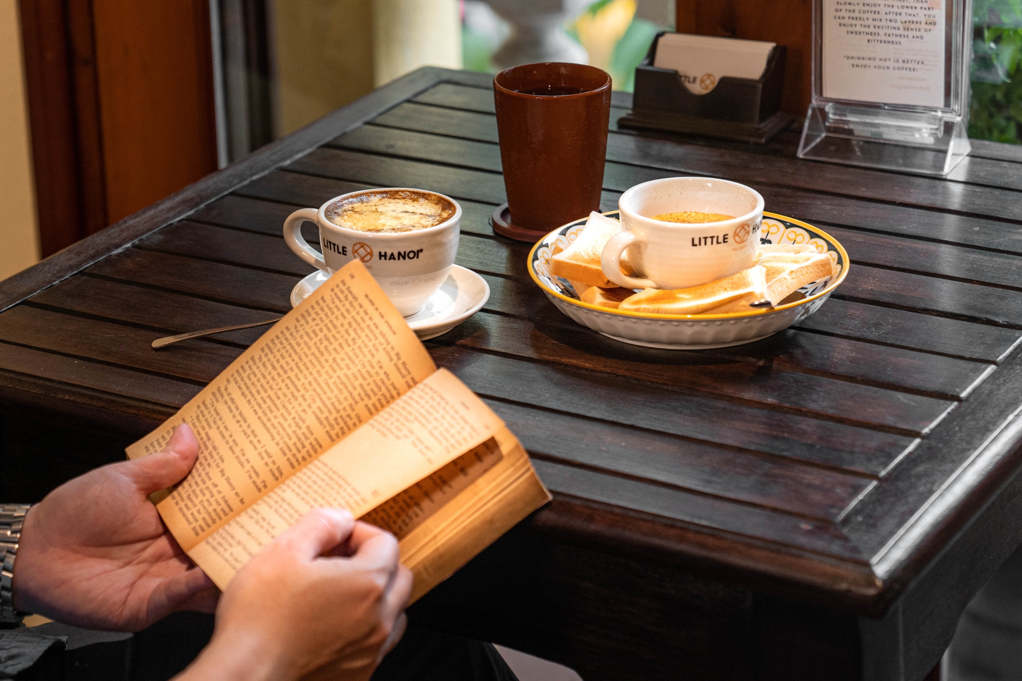 The egg coffee, with its thick, creamy top and rich flavor, is the soul of this café